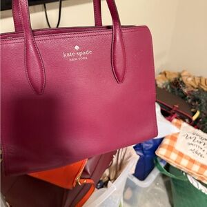 Kate Spade purse color is Burgandy